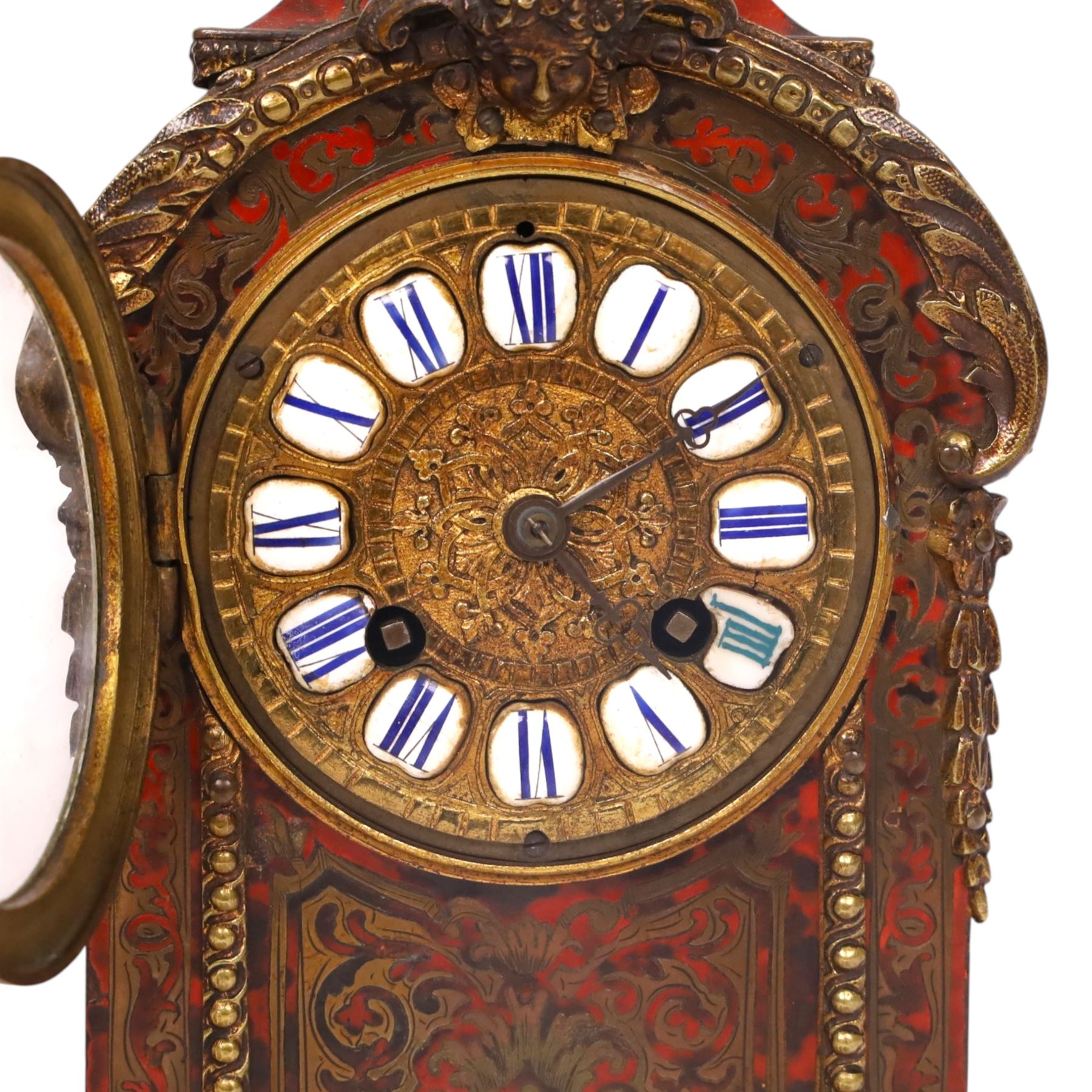 19th century,  French Boulle style mantel clock, drum movement, with a simulated scarlet tortoise shell, gilt brass dial inscribed with Roman numerals upon enamel lozenges, H30cm