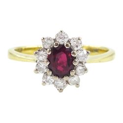 18ct gold oval cut ruby and round brilliant cut diamond cluster ring, London 1976, ruby approx 0.45 carat, total diamond weight approx 0.30 carat
