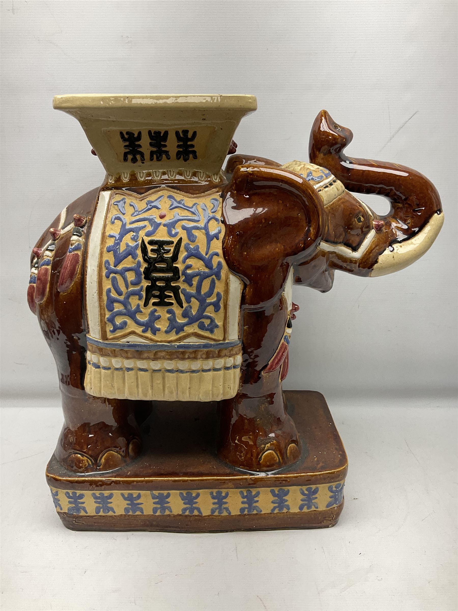 Oriental style ceramic garden seat in the form of an elephant, H55cm