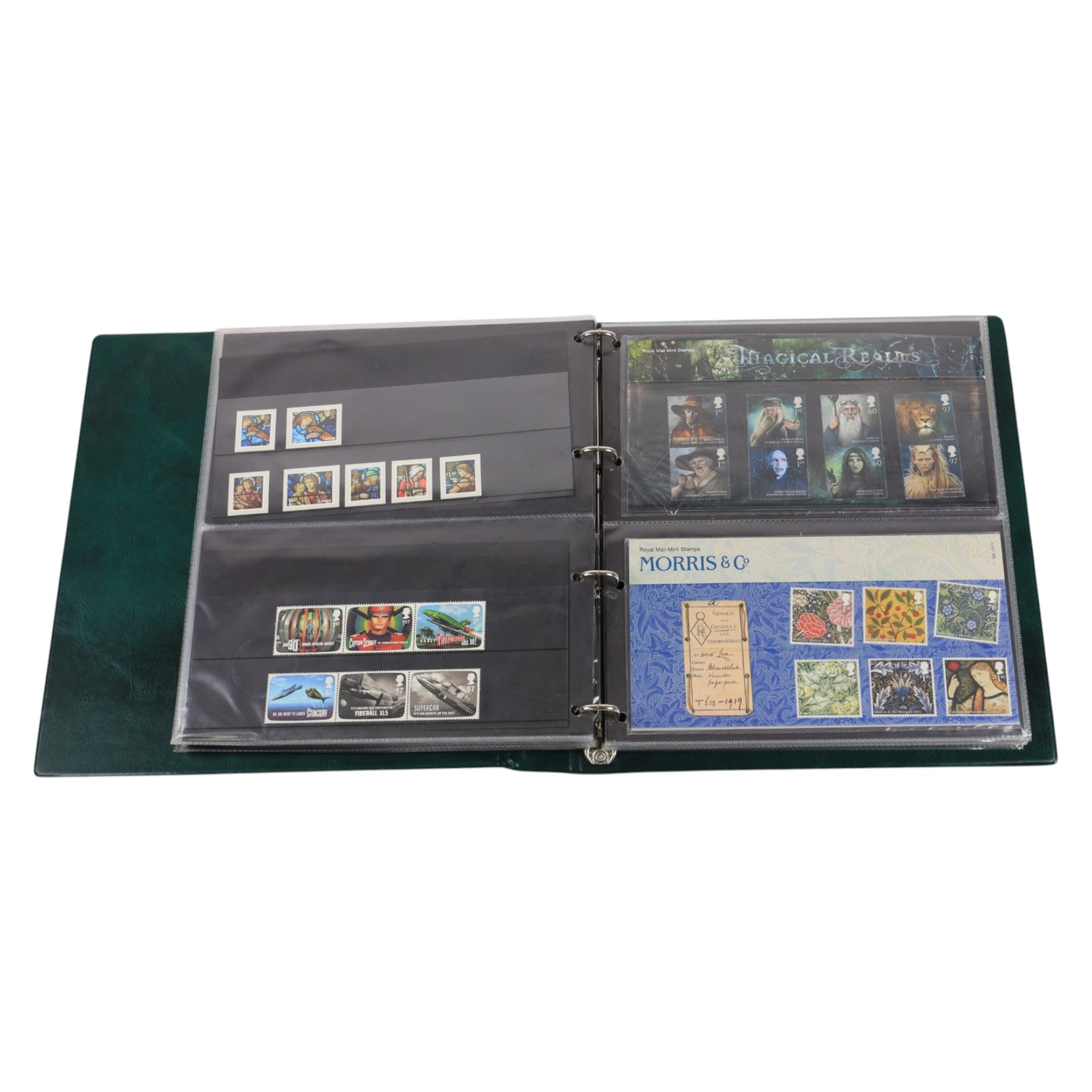 Queen Elizabeth II mint decimal stamps, mostly in presentation packs, housed in six ring binder folders, face value of usable postage approximately 750 GBP