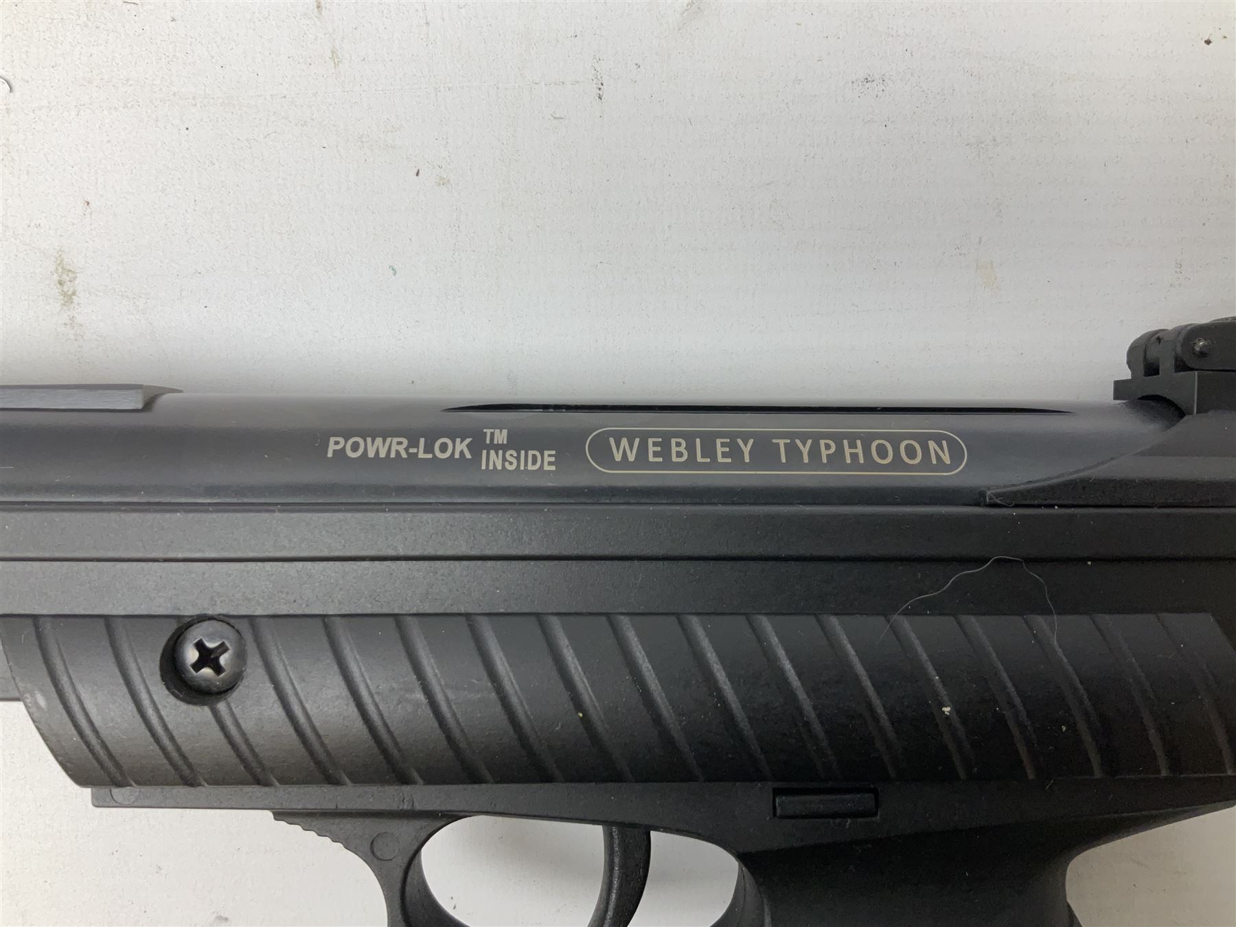 Webley Typhoon .22 air pistol, break barrel action with adjustable sight and sound moderator, serial no.1211 22509, in original box with instructions