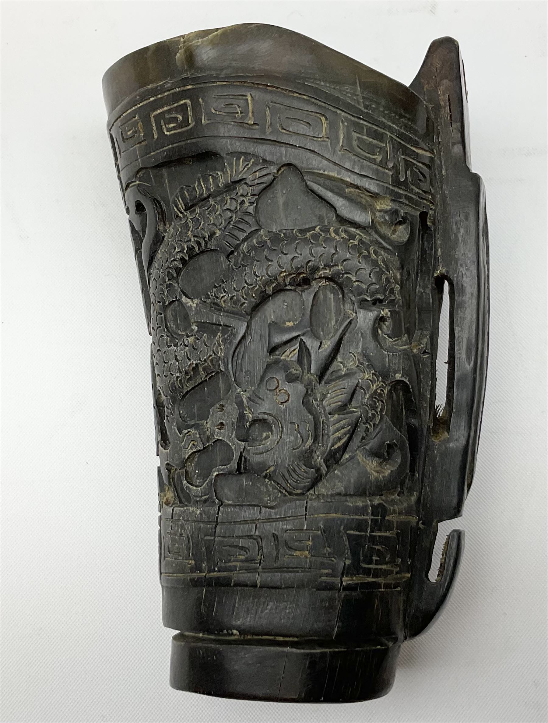 Chinese horn blood collection cup, carved with dragons and key fret border, H9.5cm