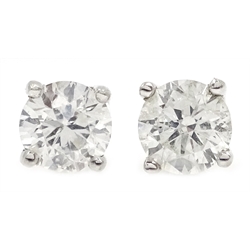  Pair of 18ct white gold brilliant cut diamond stud earrings, stamped 750, diamonds approx 0.6 carat  