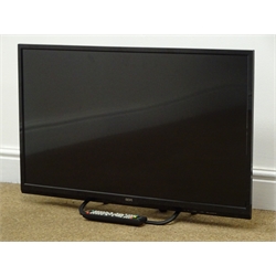  Seiki SE32HDO8UK television on stand with remote control (This item is PAT tested - 5 day warranty from date of sale)  