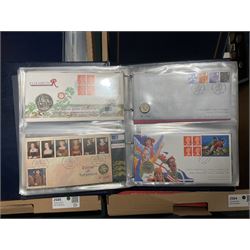 Approximately one hundred and fifteen Royal Mint coin covers, in two ring binder folders and loose, together with approximately 53 grams of Great British pre-1920 and approximately 68 grams of Great British pre-1947 silver threepence coins, and a small quantity of further pre-decimal coins