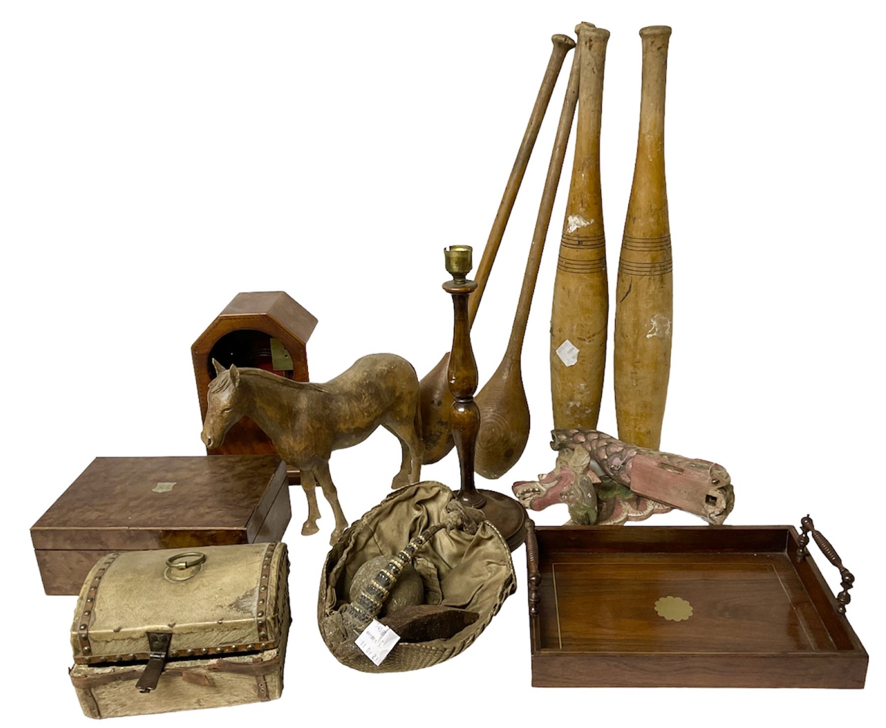 Taxidermy armadillo basket, mahogany clock case, burr walnut box, wooden exercise pins, satinwood pen tray with turned handles and a collection of other wooden collectables