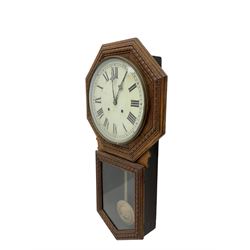 American - early 20th century  drop dial oak cased wall clock, with a hexagonal surround and 12