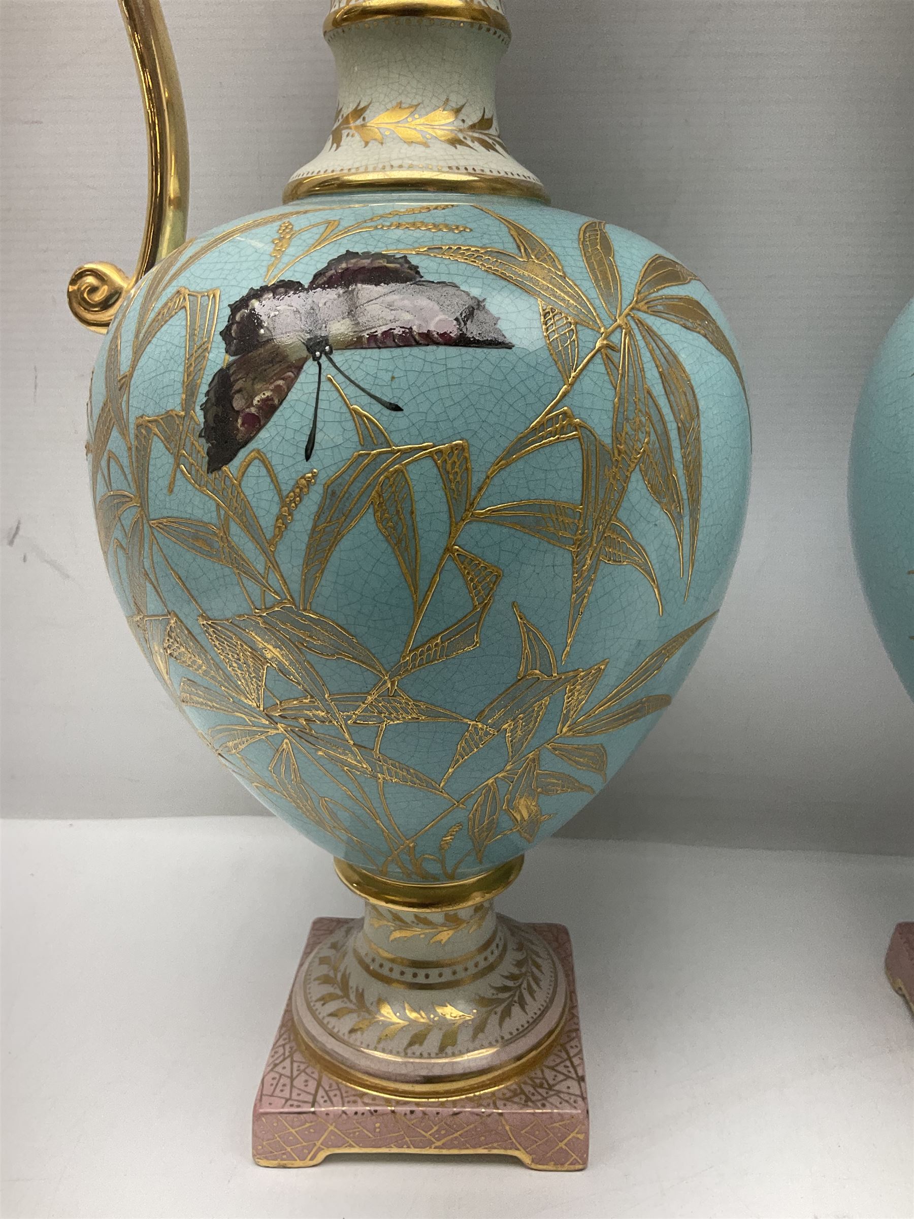 Pair rubian art pottery jugs and pair painted Doulton plates, jugs H42cm