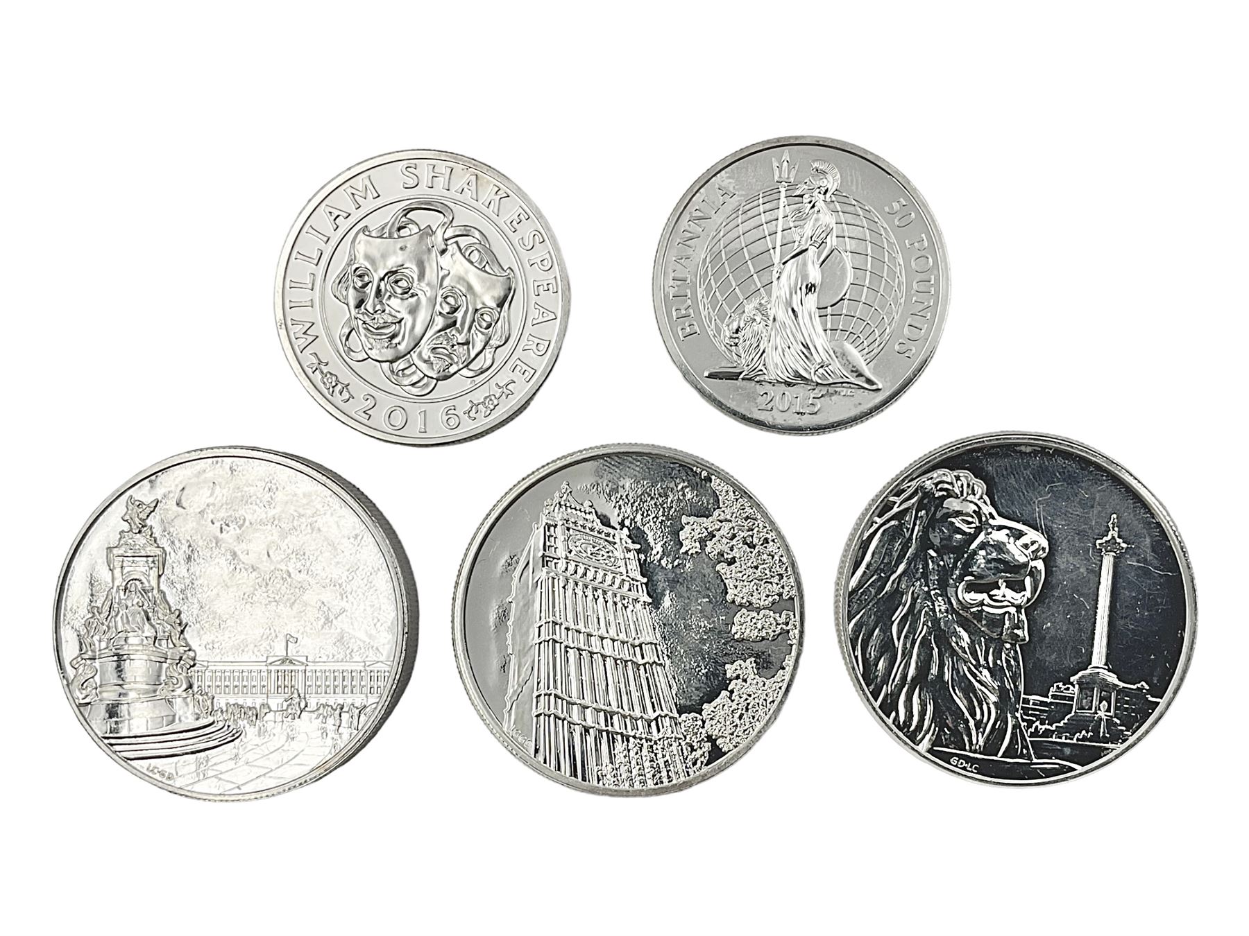 Five The Royal Mint United Kingdom fine silver coins comprising 2015 ‘Buckingham Palace’, 2016 ‘Big Ben’ and 2016 ‘Trafalgar Square’ one hundred pound coins, with 2015 ‘Britannia’ and 2016 ‘The Shakespeare Histories’ fifty pound coins