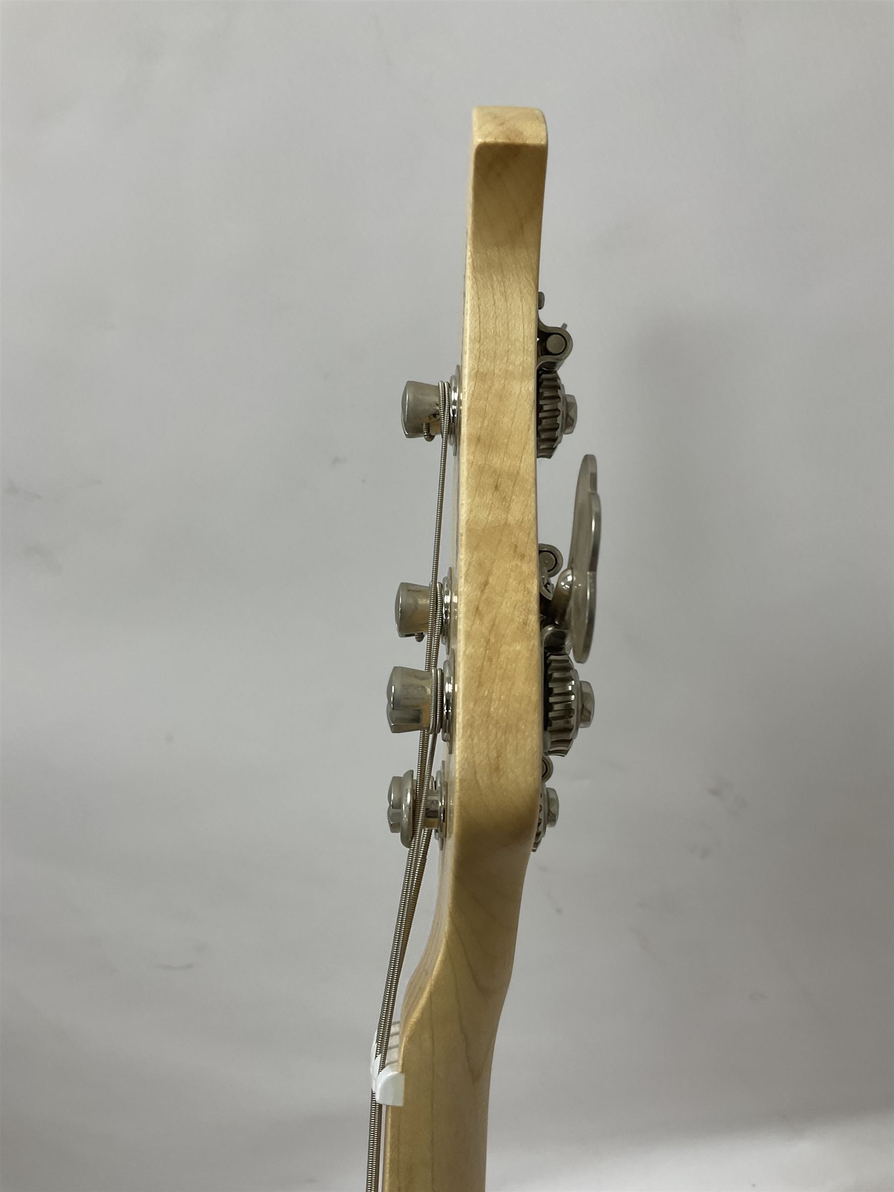 Ernie Ball Music Man Sting Ray 4 string bass guitar, in natural finish with roasted maple neck and tortoiseshell effect scratch guard, serial no 87485, in black Music Man hard case, guitar L114cm