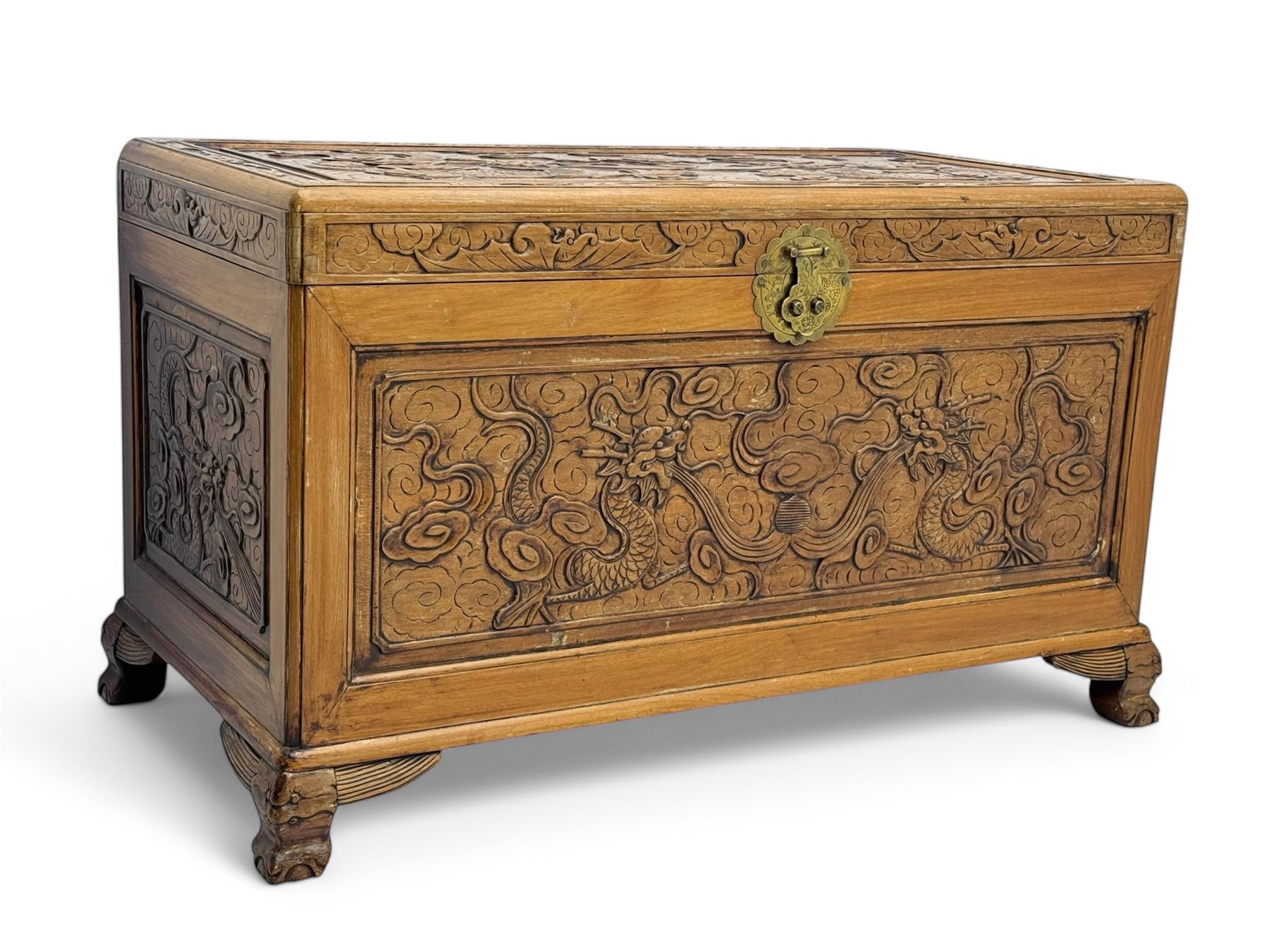 Chinese camphorwood blanket chest with stylized dragon carved decorated lid