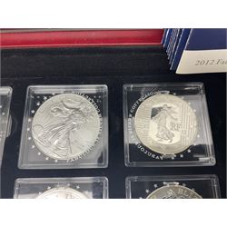 'The 2012 Fabulous 12 Silver Coin Collection' including Queen Elizabeth II Britannia one ounce silver two pound coin, Queen Elizabeth II Canada Maple Leaf one ounce silver five dollar coin, Queen Elizabeth II Australian Koala one ounce silver one dollar coin, Austrian Philharmonic one and a half euro coin, etc., in wooden presentation case