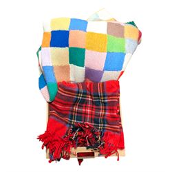 Multicoloured knitted patchwork blanket and a tartan blanket, etc