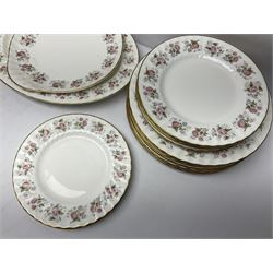 Minton Spring Bouquet pattern dinner and tea service, comprising dinner plates, twin handled tureens with covers, meat platter, teapot, milk jug, sugar bowl with cover, tea cups and saucers, bowls, cake plate, side plates, dessert plates, etc all with printed mark beneath (82)