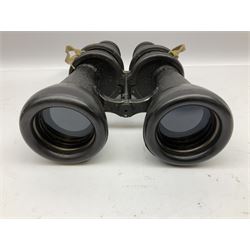 Pair of WWII German U-boat binoculars probably 7 x 50 by Leitz, with rubber eye piece protector covers and leather case stamped with Kriegsmarine mark to the lid and dated 1944, with leather strap.