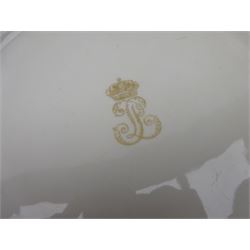 Pair mid 19th century Sevres porcelain plates, with gilt Louis Phillippe crowned monogram to centre upon a white glazed ground, with blue crowned LP mark, iron red destination mark for Chateau D'Eu, and chrome green cancelled potting mark S67 beneath, in carved oak mounts, overall D34cm
     