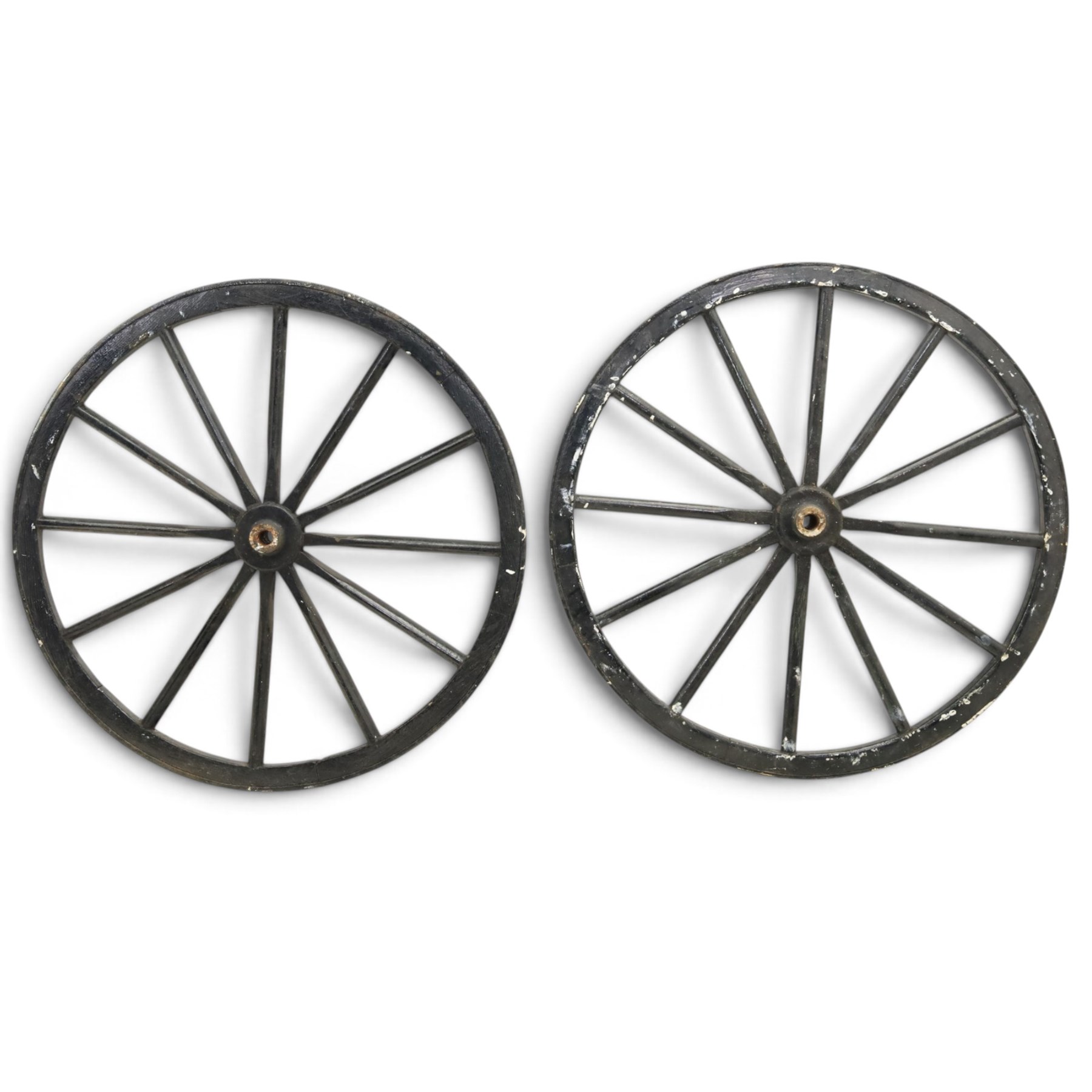 Pair of Victorian black lacquered and painted cartwheels with twelve spokes