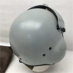 Silver grey SPH-4B Flight Helmet as used by helicopter pilots in the USAF and US Army in the 1990s; made of epoxy resin reinforced fibreglass; fitted with clear and tinted visors and complete with an M-87A/AIC boom mike; original condition and bench tested.
