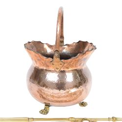 Victorian copper coal bucket, of bellied form with swing handle, upon three brass lion paw feet, not including handle H33cm, together with brass fireside accessories