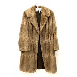 Ladies light brown three quarter length musquash fur coat