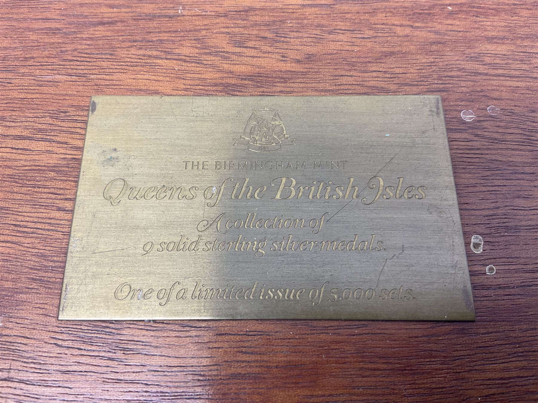 The Birmingham Mint 'The Queens Of The British Isles' sterling silver hallmarked nine medal set, housed in a fitted case, overall combined weight of the medals approximately 400 grams