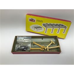 Hornby Dublo - 5006 Engine Shed Extension Kit; 5085 Suburban Station Kit with instructions; and 5030 Island Platform Kit; all in pictorial boxes; and Goods Depot Moulded Kit in box base only (4)