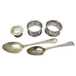 Group of Georgian and later silver items, to include two spoons, pair of napkin rings and a bottle lid, all hallmarked, approximate total silver weight 2.63 ozt (81.9 grams)