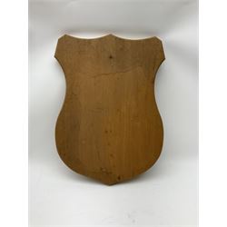 Five wooden shield plaques for mounting taxidermy of various sizes, largest H67cm, D51cm. 