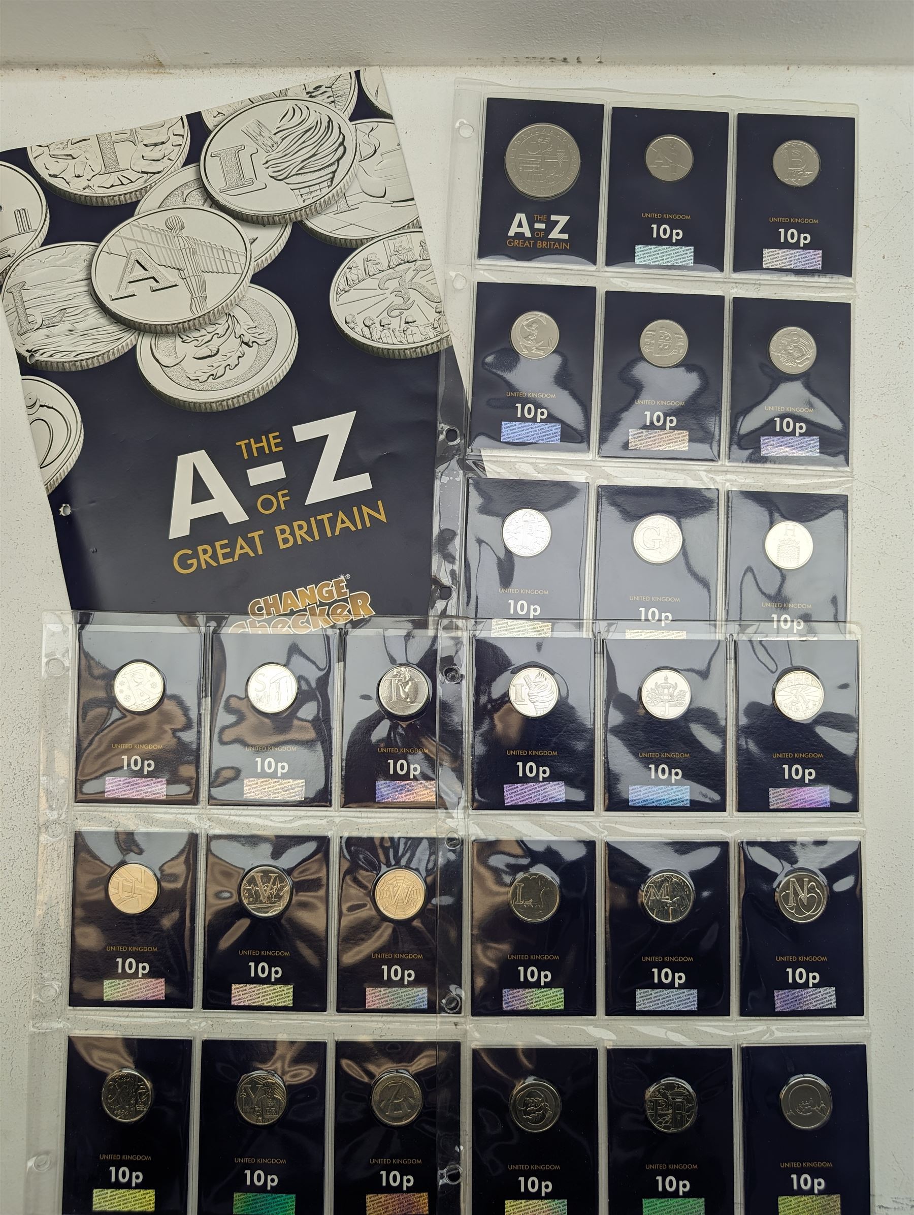 Queen Elizabeth II United Kingdom 2018 A to Z ten pence coin collection, with completer medallion, on Change Checker cards