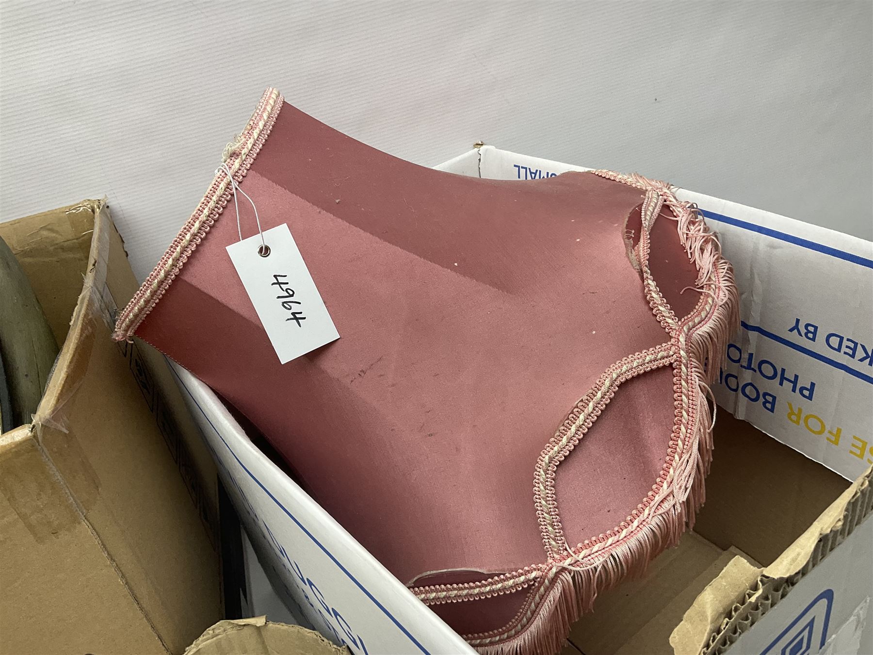 French Adrian helmet and cow horn gong stand; and quantity of lamp shades, etc, helmet H47cm