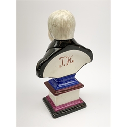 An unusual Staffordshire bust, probably Barker, Sutton and Till, modelled as William Clowes, upon pedestal base with inscription, the bust with painted initials verso T.H, H26.5cm. 