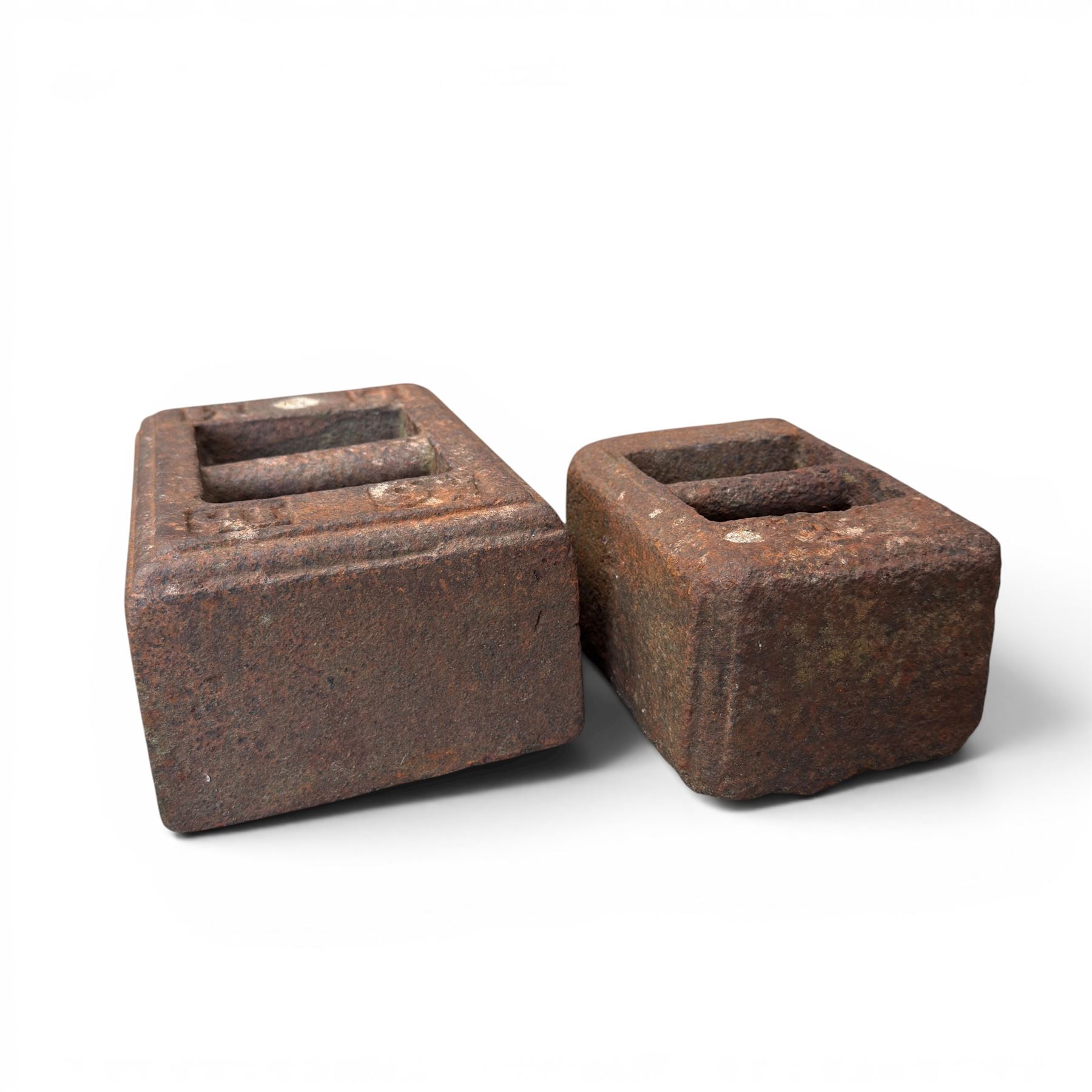  Cast iron corner manger along with one 56lb cast iron weight and another of unknown weight