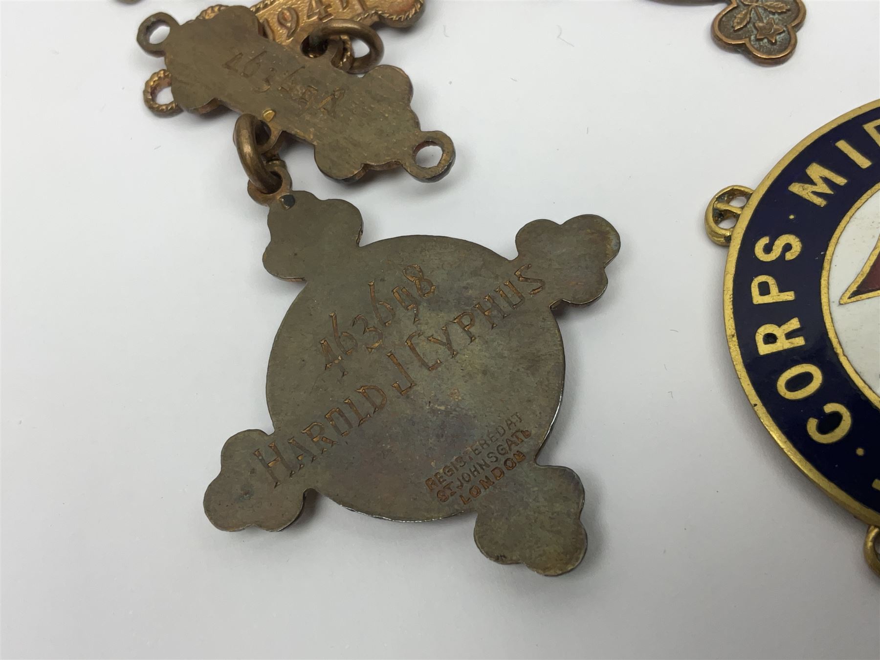 Collection of St John Ambulance enamel and metal badges, together with Red Cross medals and badges