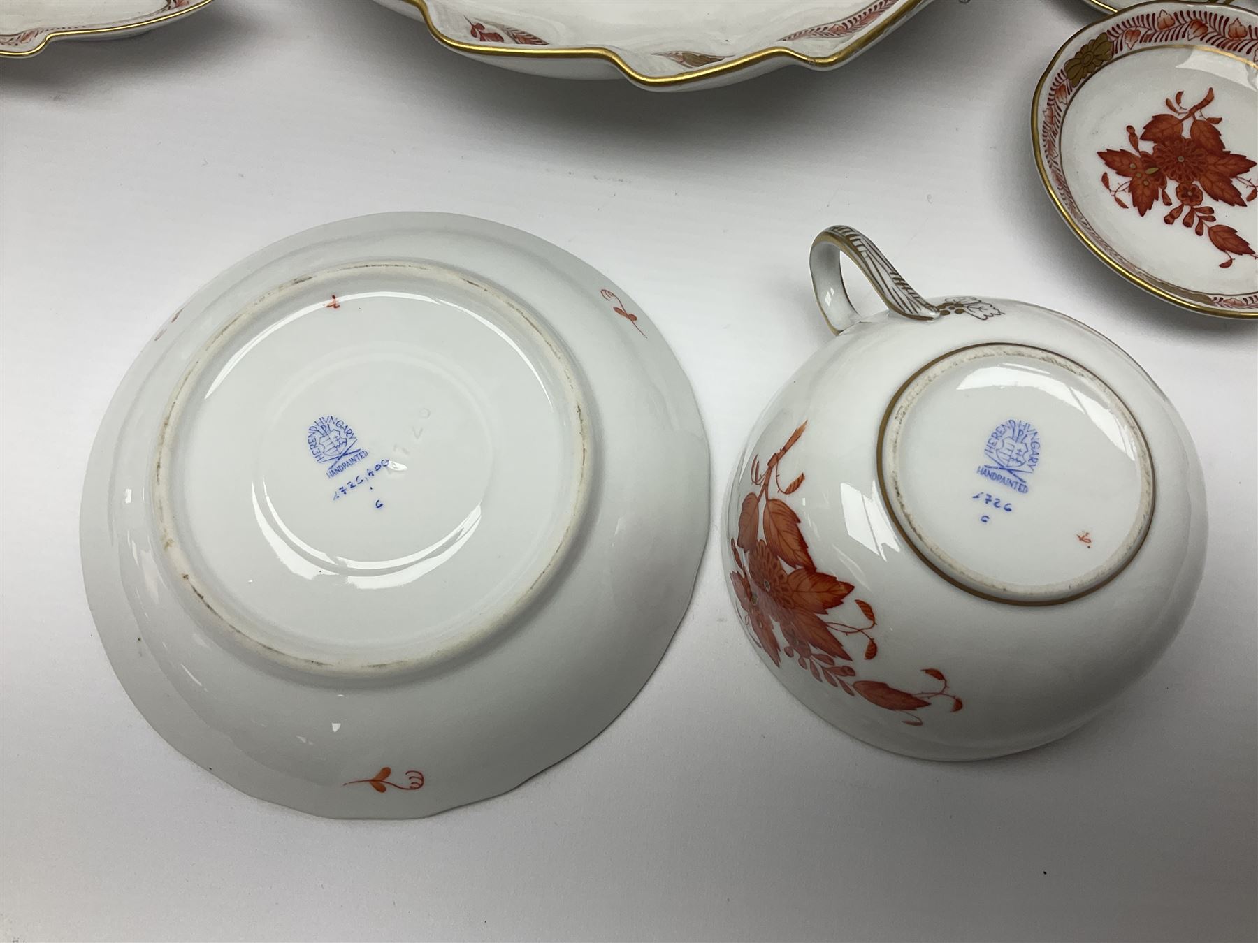 Herend Chinese Bouquet Rose pattern tea service comprising teapot, coffee pot, open sucrier, six cups and saucers, six tea plates, cream jug and stand, milk jug, two teabag holders, preserve pot, two leaf shaped dishes, four egg cups, salt & pepper pots, pair side plates and another plate