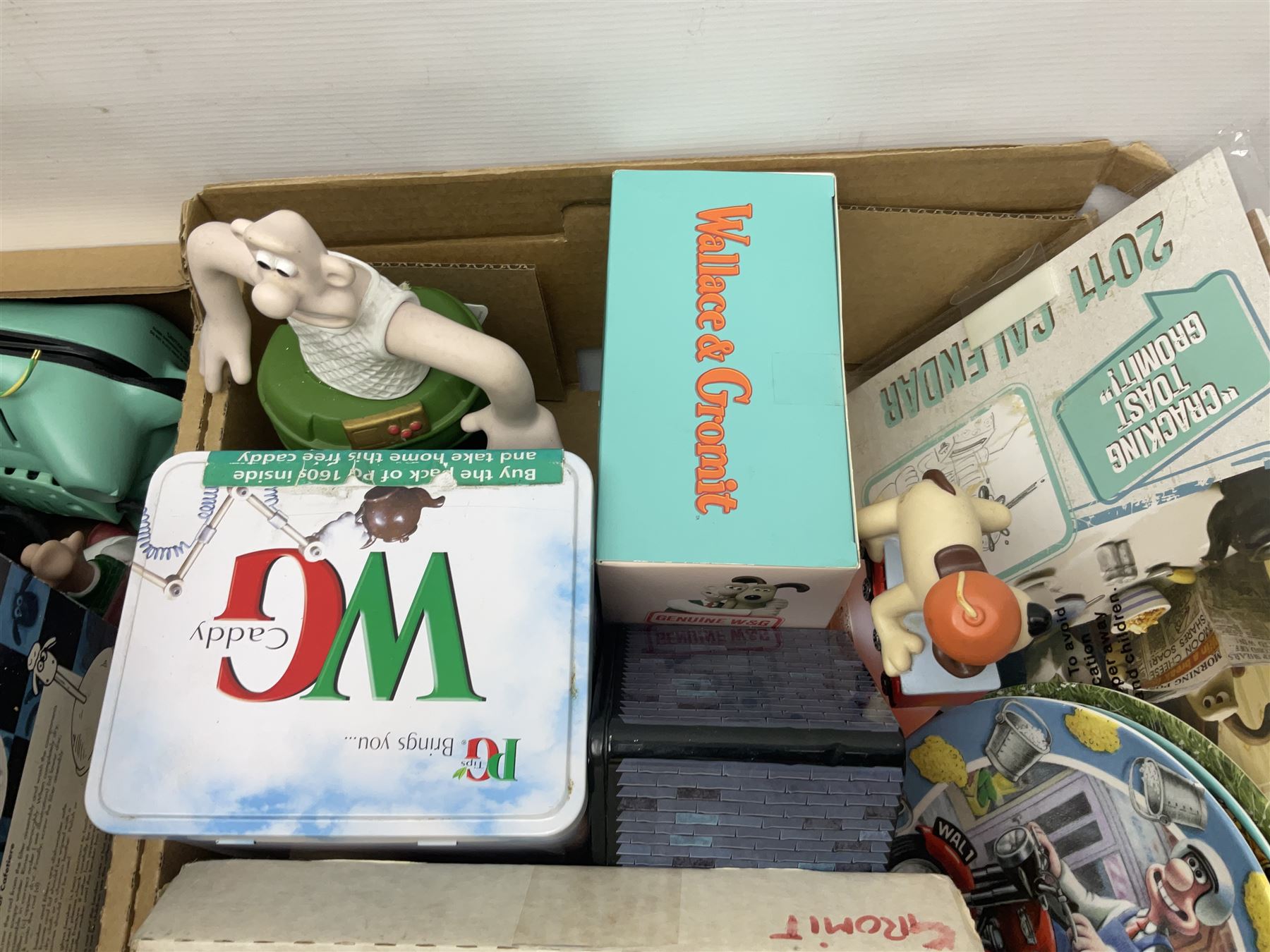 Wallace and Gromit and Shaun the Sheep collectables, including alarm clocks, plates, cafetiere, soft toys, etc, in two boxes