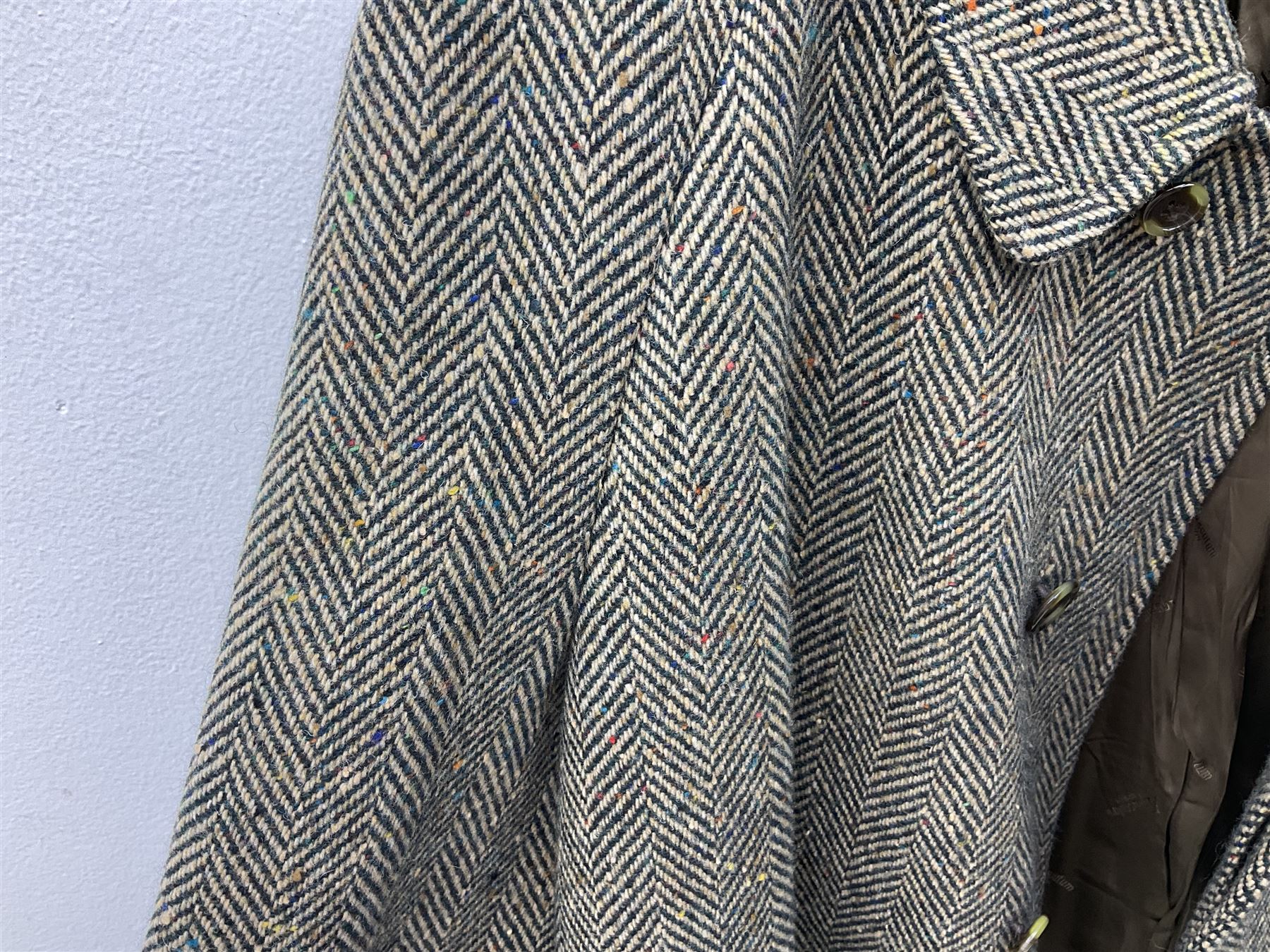 Men's Aquascutum lambs wool herringbone tweed coat with silk lining, 46 Reg, together with a further Men's Aquascutum grey wool duffle coat, with cheque lining and horn buttons, 46