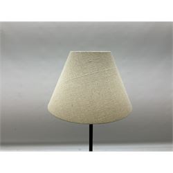 Table lamp, with a thin central stem upon a square stepped base, natural linen shade