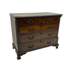 Georgian mahogany chest, fitted with two short and three long drawers flanked by carved fluted pilasters, raised on ogee bracket feet