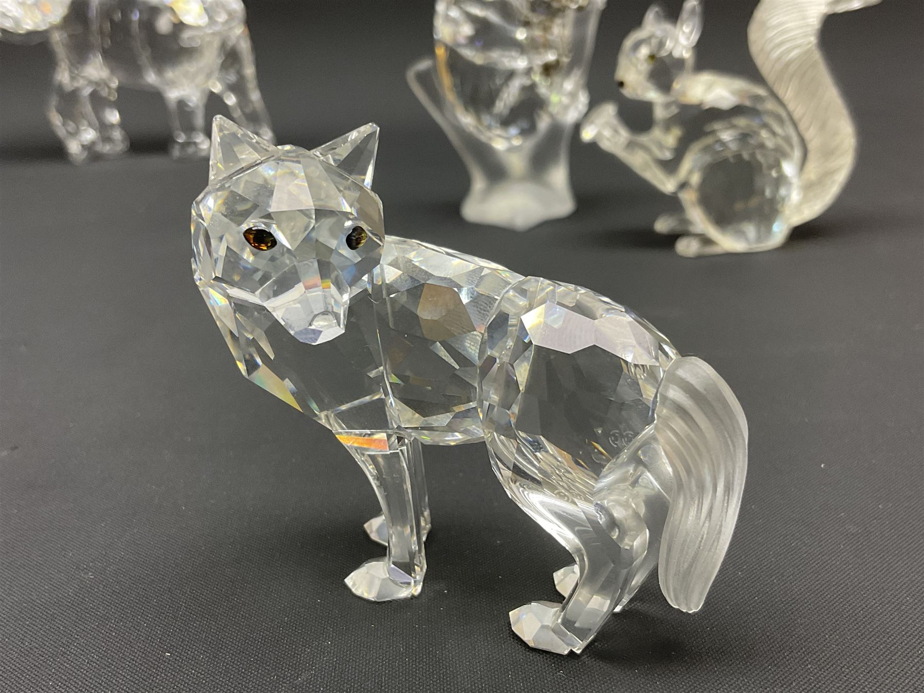 Twenty nine Swarovski Crystal animals, to include koala and baby, in frosted tree branch, elephants, polar bears, squirrel, monkeys, panda, unicorn and snails, etc 