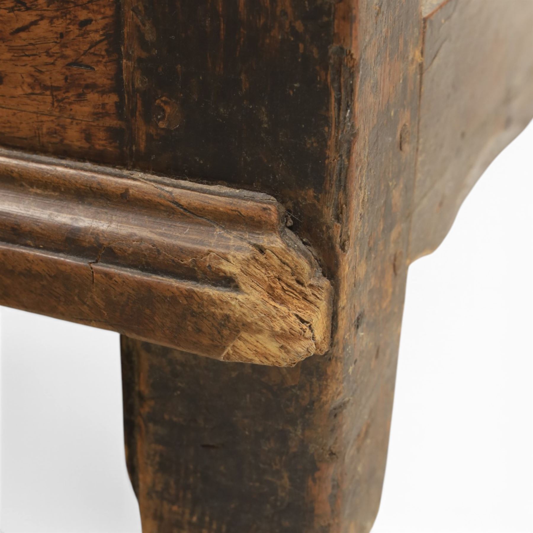 George III oak dresser base, rectangular top with moulded edge, three fielded panelled drawers with brass swan neck handles, over four fielded panelled front with the central two cupboard doors, raised on stile supports