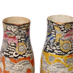 Pair 19th century Mason's Bandana pattern jugs, decorated in with Foo dogs, medallions, and cloud scrolls, H12cm