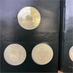 Limited Edition Danbury Mint 'History of the English Speaking Peoples' complete set of fifty silver medallions, each depicting historical figures and scenes from Julius Caesar Lands 55BC to Second World War 1939AD, contained within leatherette folder with personalised presentation to cover and interior, no. 2780/7500