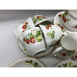 Ringtons and Queen's China Virginia Strawberry pattern teawares, including teacups, saucers, milk jugs, sugar bowls, etc