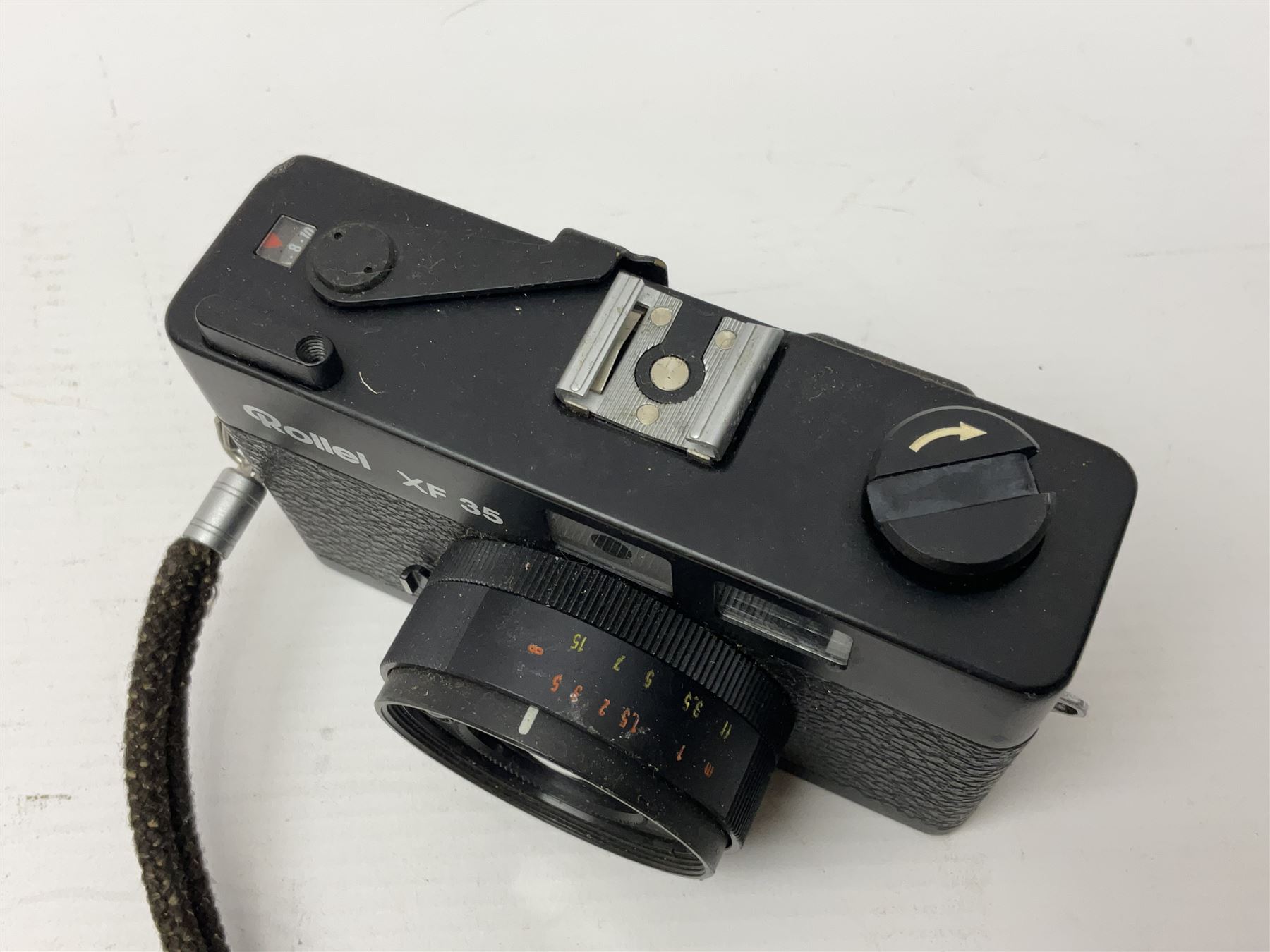 Three Rollei cameras, to include a Rollei 35 LED camera, with Triotar 3.5/40 lens and two Rollei XF 35 cameras, each with Sonnar 2.3/40 lenses