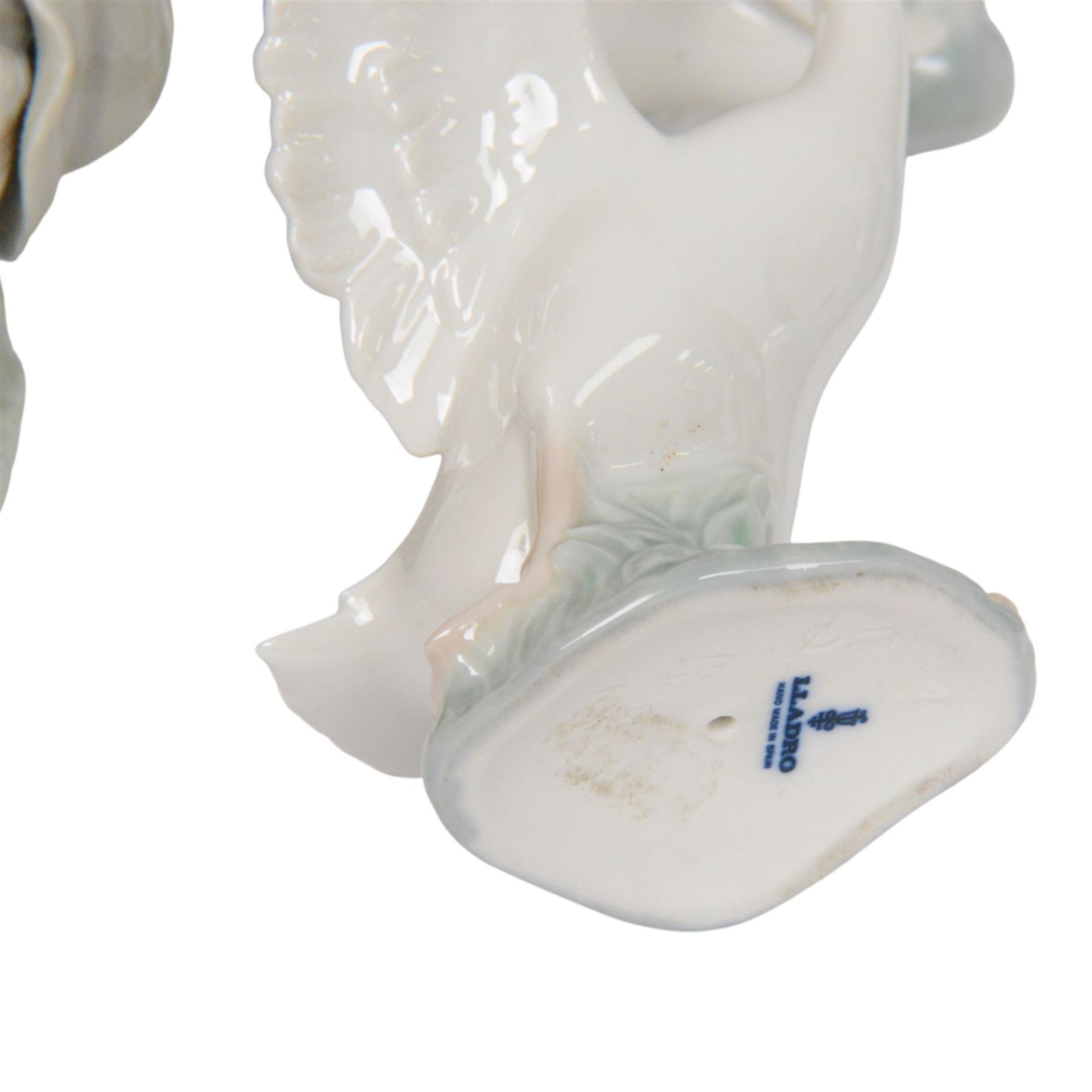 Ten Lladro figures, including Swan 5231, Friendship 1230, Geisha Girl 4989, Boy with Yacht etc 