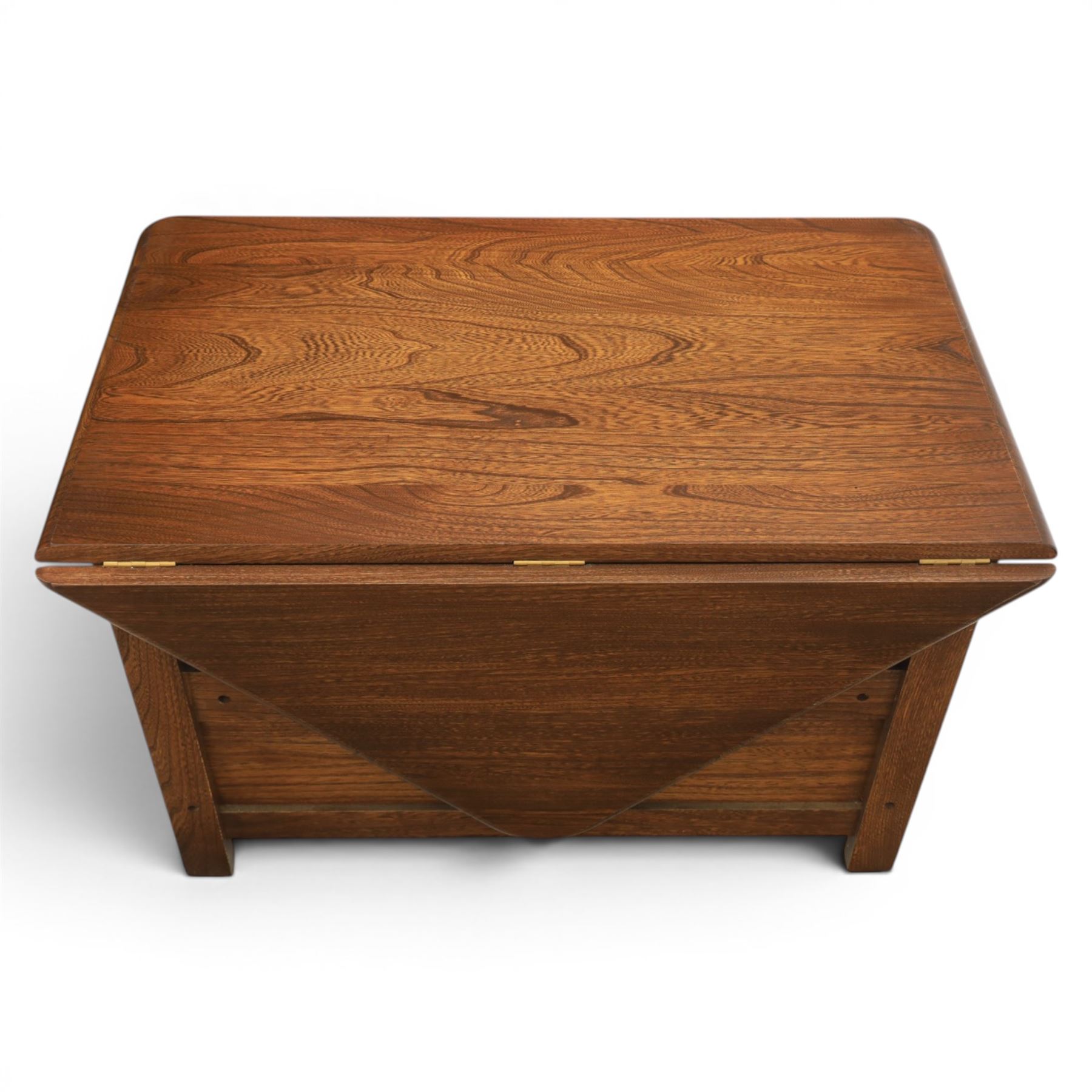 Ercol -  dark elm corner TV stand and coffee table, TV stand with drop triangular leaf, over open recess above a single drawer (H 47cm, D 44cm with leaf 79cm, W 73cm,  the coffee table with chamfered rectangular top with full length undertier, raised on turned supports (H 43cm, D 54cm, W 115cm) 