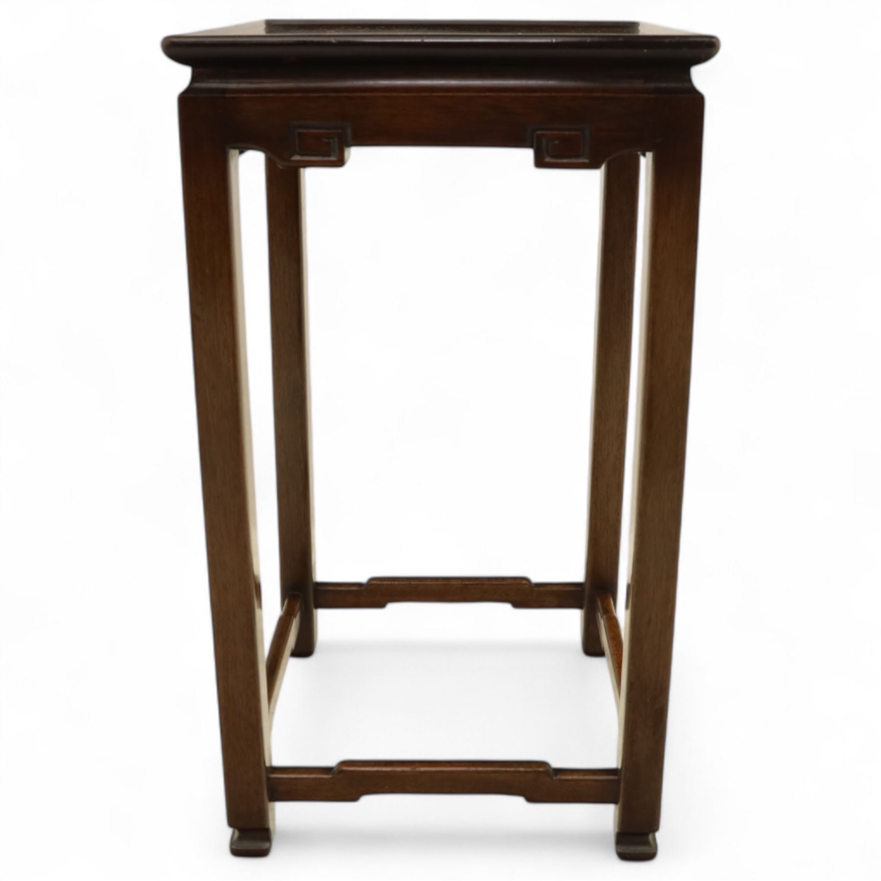 Whytock & Reid, Edinburgh  - Edwardian nest of three Chinese-style solid mahogany occasional tables, rectangular top with finely moulded edge above slim square section legs with subtly chamfered inner edges, joined by H-shaped stretchers, largest W40xD33xH52cm