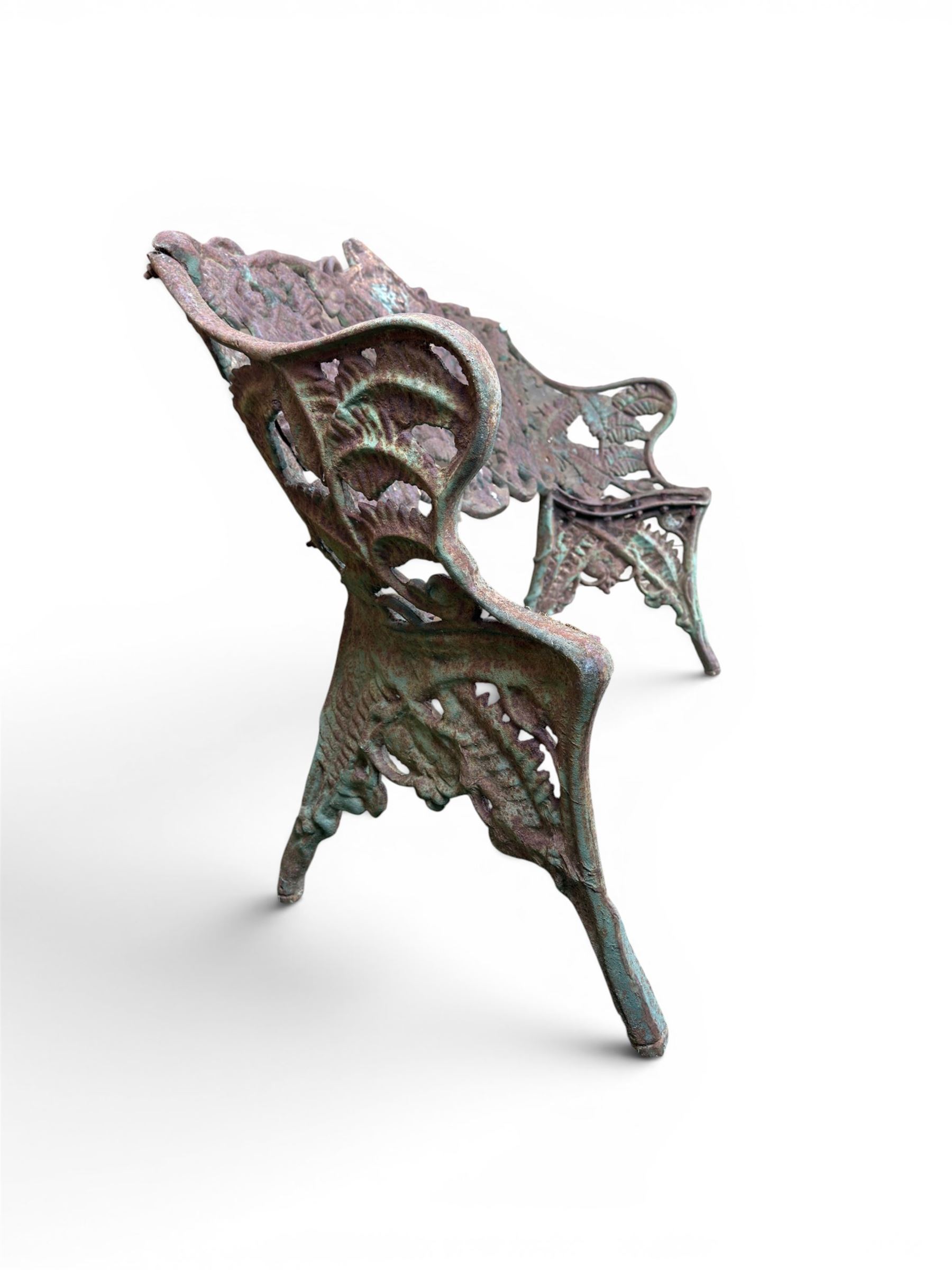 Victorian naturalistic design heavy cast iron garden bench, well defined fern pattern curved back-rest with arms, lacking seat slats for restoration