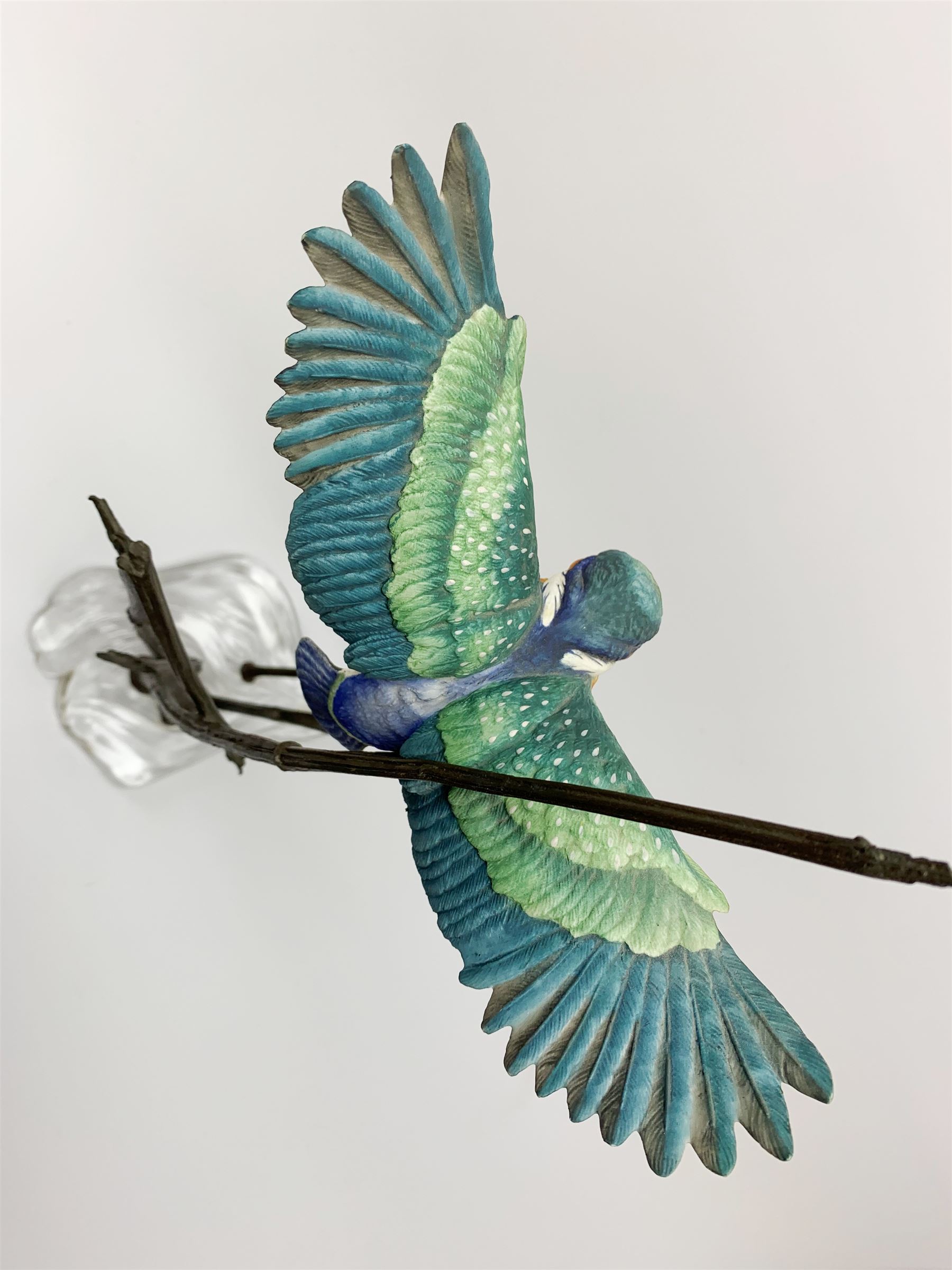 David Fryer Studios for Royal Worcester, a limited edition bronze and porcelain model of a kingfisher in flight, supported by bronze rushes, upon a clear base, signed D Fryer, and numbered 206/750, H48cm. 