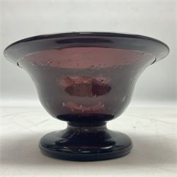 19th century hand blown amethyst glass bowl, the flared bell form bowl with folded rim raised upon circular spreading foot, with bubble inclusions throughout, D11.5cm